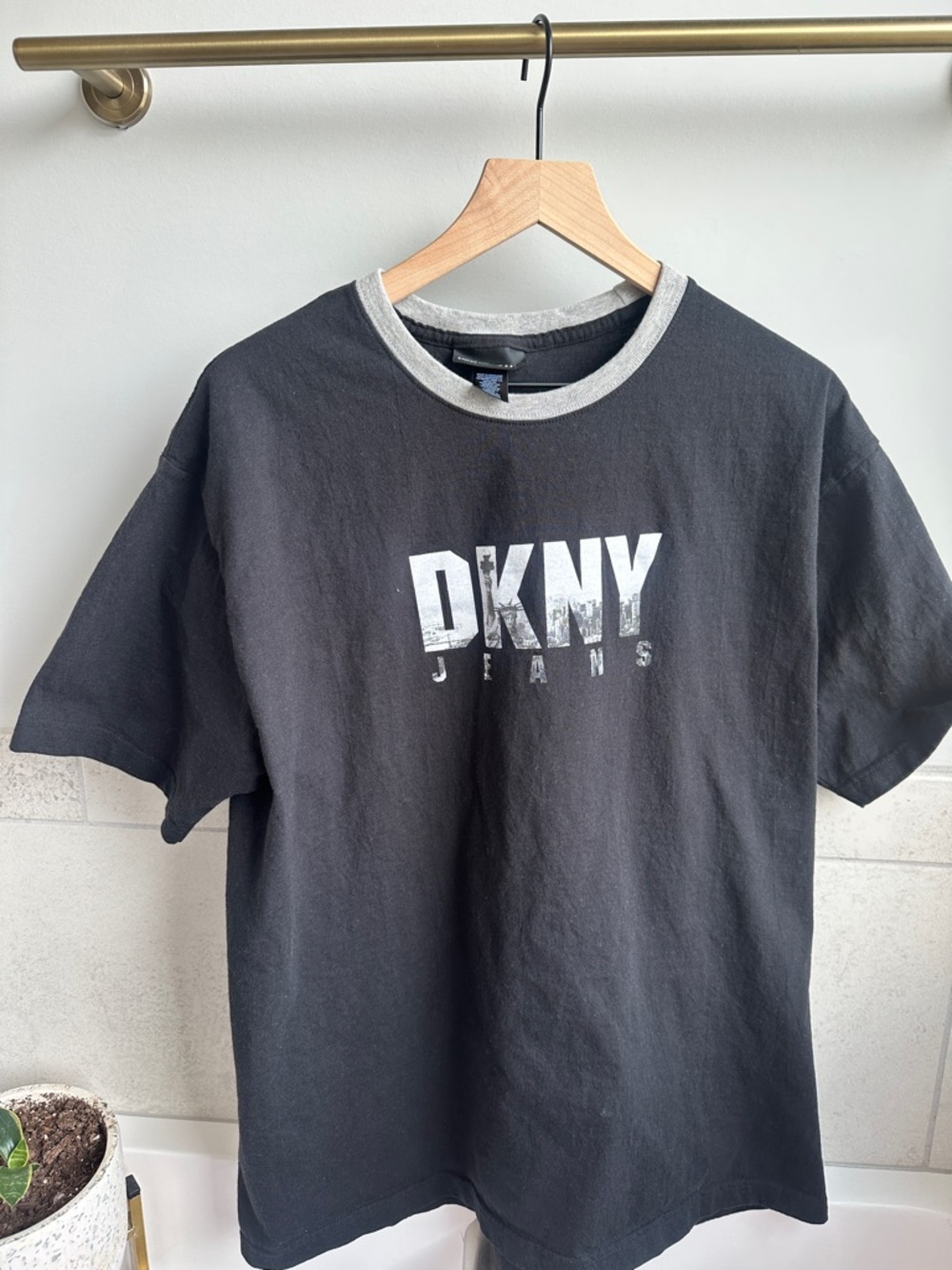 Vintage DKNY Black T-Shirt with Gray Ringer Collar and White Logo